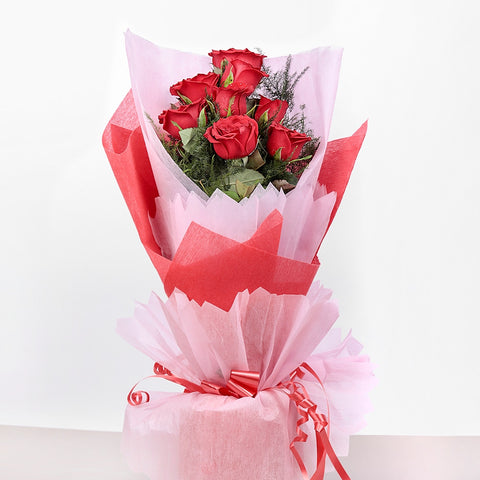 10 Red Roses In Paper Packing