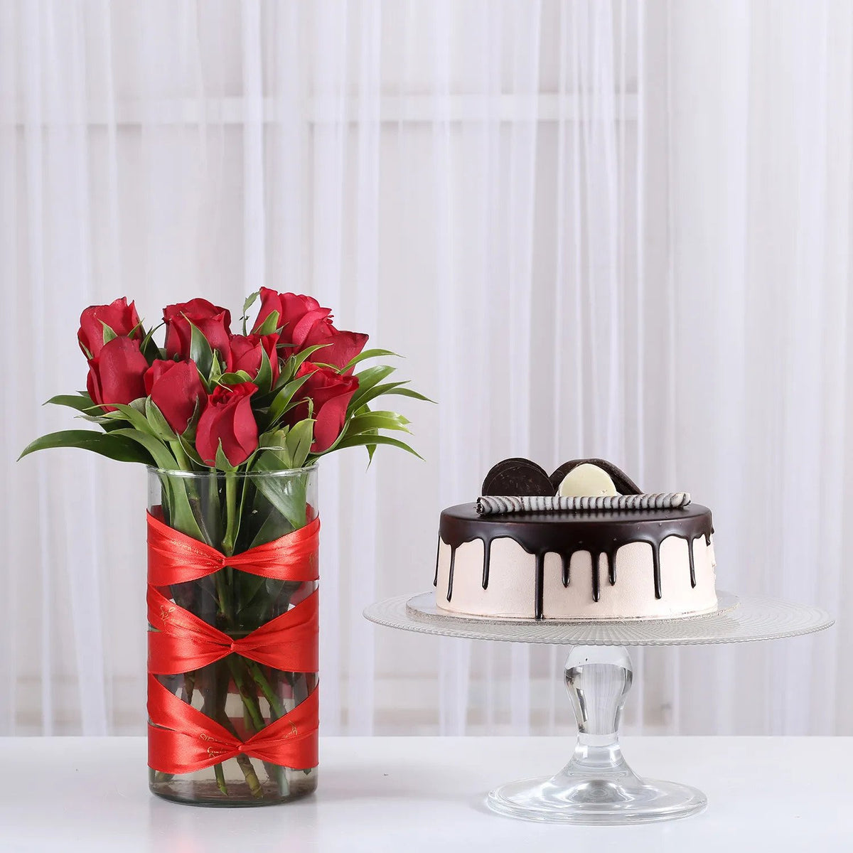 Red Roses Vase & Chocolate Cake Combo100% safe & clean Hygiene Maintained